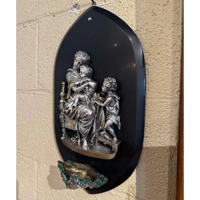 This beautiful antique holy water stoup is a fine example of French religious artistry. Crafted in France circa 1920, the...