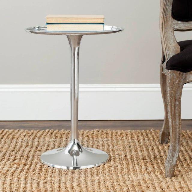 Choose the Sleek table as a sophisticated accent for contemporary interiors. With graceful lines, shimmering tones, and a...