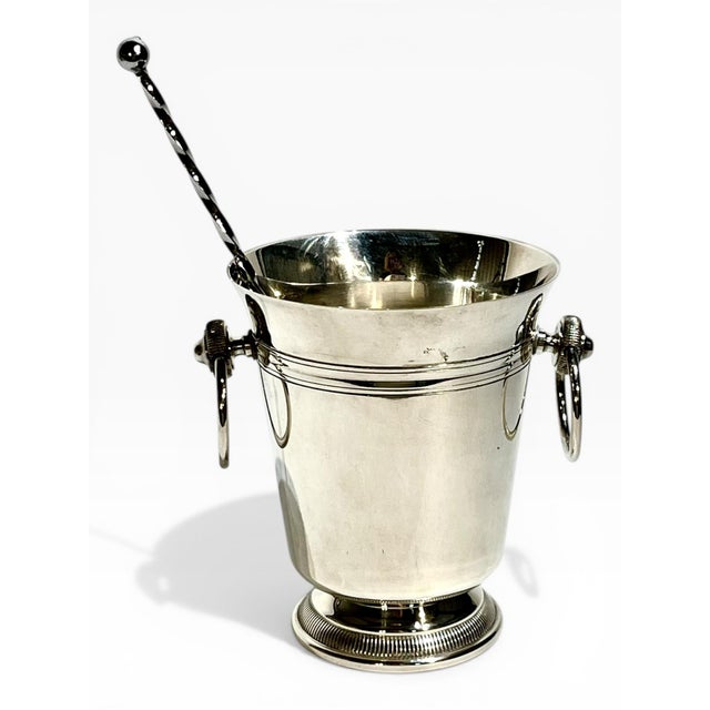 Elevate your bar cart or entertaining space with this stunning Vintage French Art Deco Silver Plate Ice Bucket. Crafted in...
