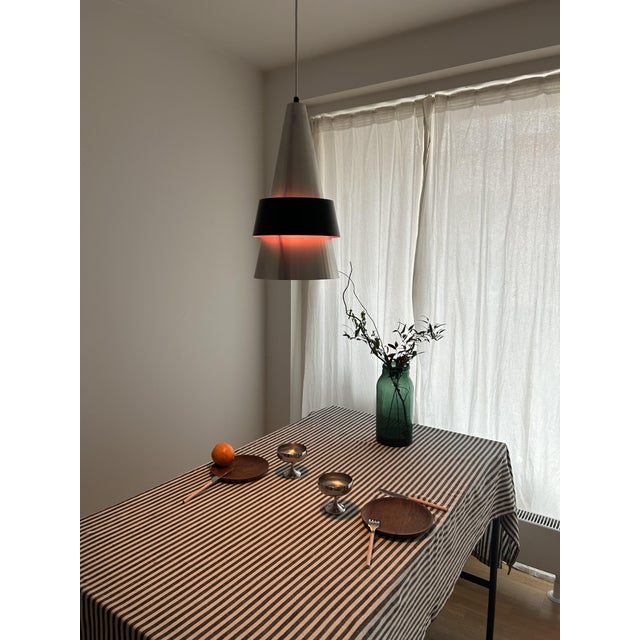 One of Jo Hammerborg's earliest and most quietly beautiful designs for Fog & Mørup — the Corona pendant features a...