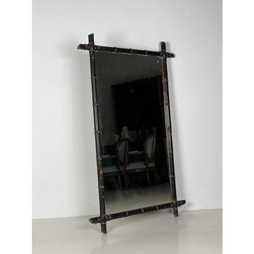 French faux bamboo mirror of very large size. Approx. 1910. In good condition with some signs of wear here and there....