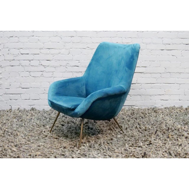 Plush armchair from France, 1950s. The armchair has completely new upholstery, its form is a typical "bucket". - The form...