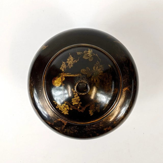 Beautiful black leather and gold gilt painted of birds on a tree