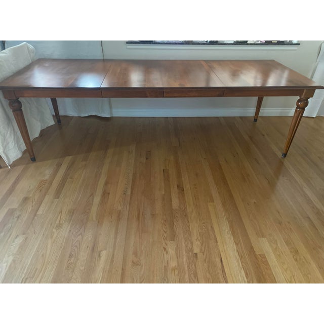Late 20th Century Ethan Allen Country Crossings "Farm House Style" Dining Table A mix of historical design, influences,...