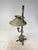 Beautiful and elegant vintage table candelabra with a height-adjustable metal shade. Featuring a solid, decorative base in...
