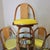 Brown Four Rattan Swivel Chairs With Matching Table and Yellow Upholstery For Sale - Image 8 of 12