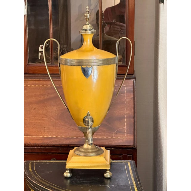 A beautiful tole water heater in a lovely color.