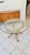 Gorgeous bamboo table with glass top and metal legs. The legs depict flamingo heads with claw and ball feet in a mix of...