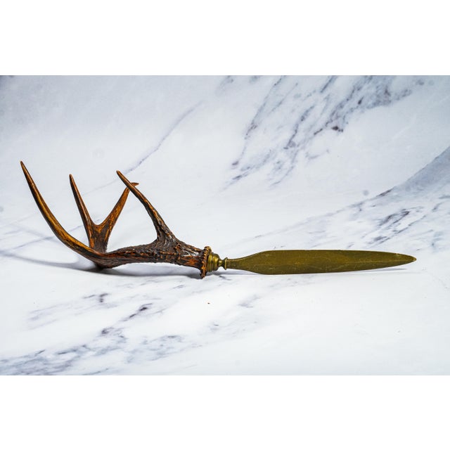 Make a commanding statement on your desk or in a curated interior with this exceptional Victorian-era antler-handled...