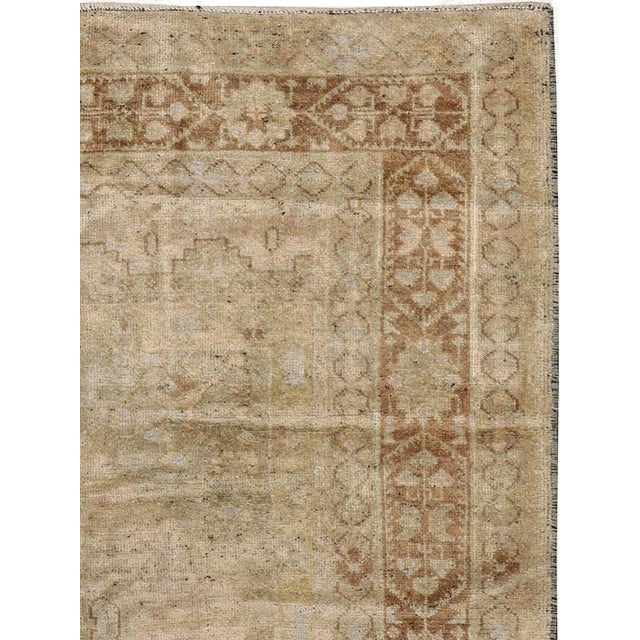 An antique Turkish Oushak carpet from the second quarter of the 20th century. Measures: 4' 3" x 7' 5"
