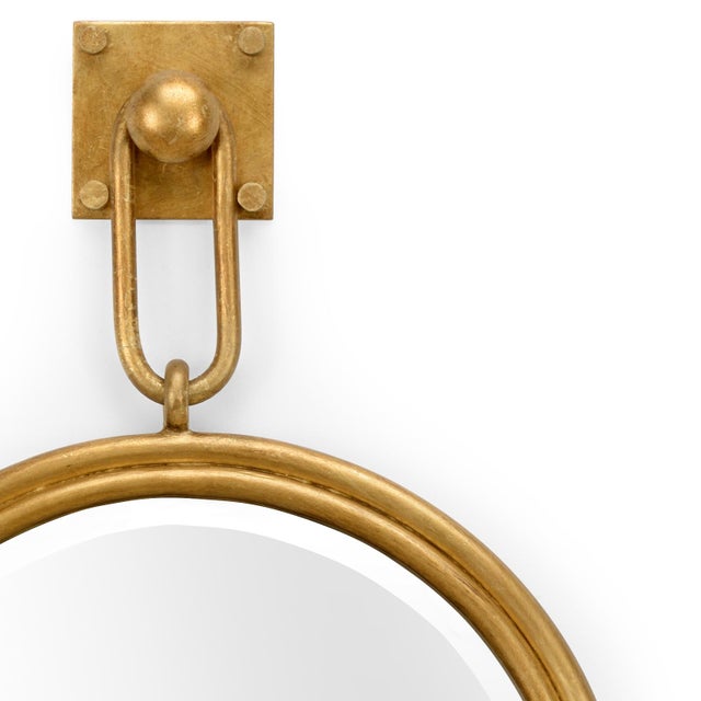 Open up your space while adding style with Lucia Mirror. This versatile accent mirror features an antique gold leaf finish...