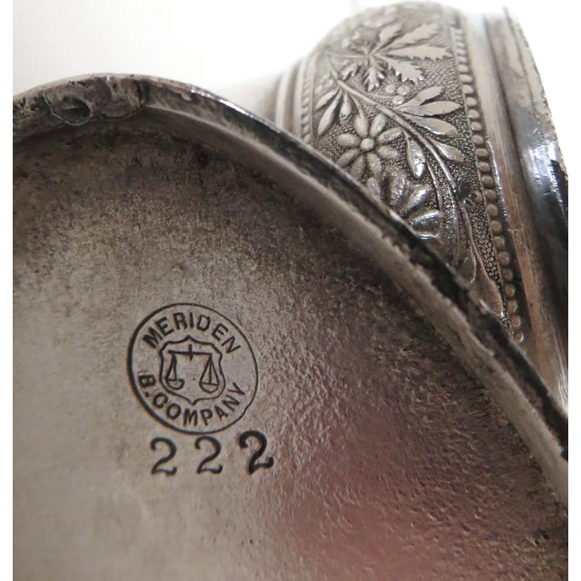 Avian aficionados will be attracted to this authentic and all original Victorian silver plated figural napkin ring...
