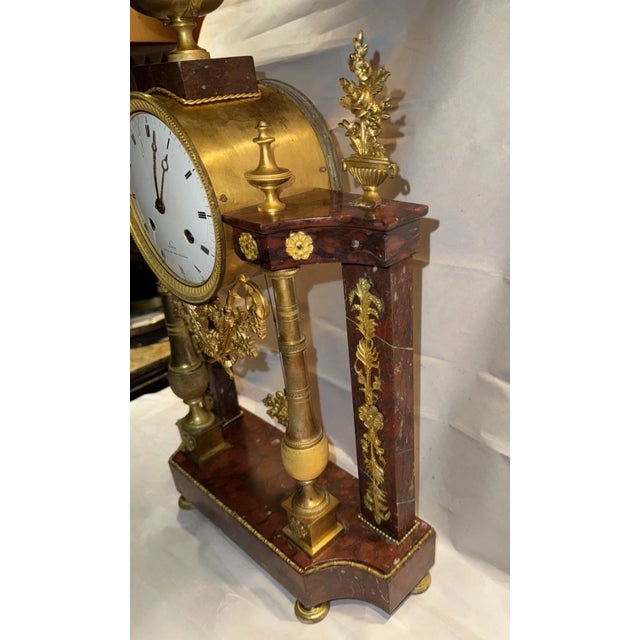 This listing is for an antique French mantel clock. This clock was made in the portico style by master artisan, Lucin of...