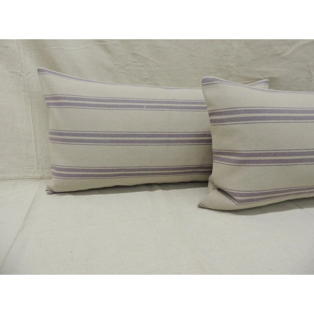 Pair of modern lavender and natural long bolster decorative pillows. Soft gray texture cotton backings. Decorative pillow...