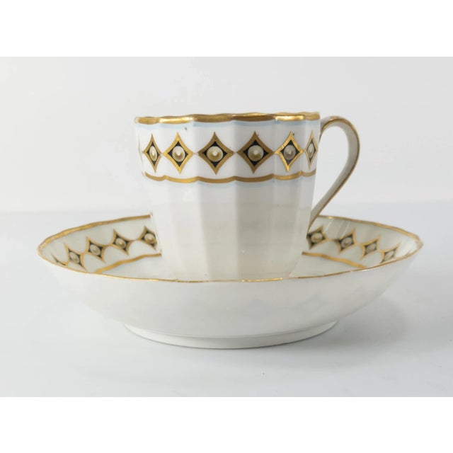 We are selling this rare and unusual Royal Crown Derby cup and saucer set. This very unique pattern has attractive design...