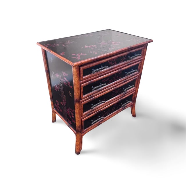 THEODORE ALEXANDER DECORATED BAMBOO LOW 4 DRAWER CHEST. A beautifully crafted Theodore Alexander four-drawer chest...