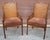 Palecek Mid-Century Modern Hollywood Regency style armchairs, characterized by their faux bamboo frames and double cane...