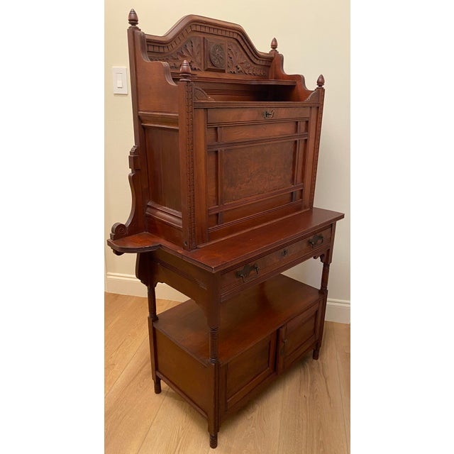 A striking late 19th-century Victorian secretary desk with Art Nouveau influence, showcasing an exceptional combination of...