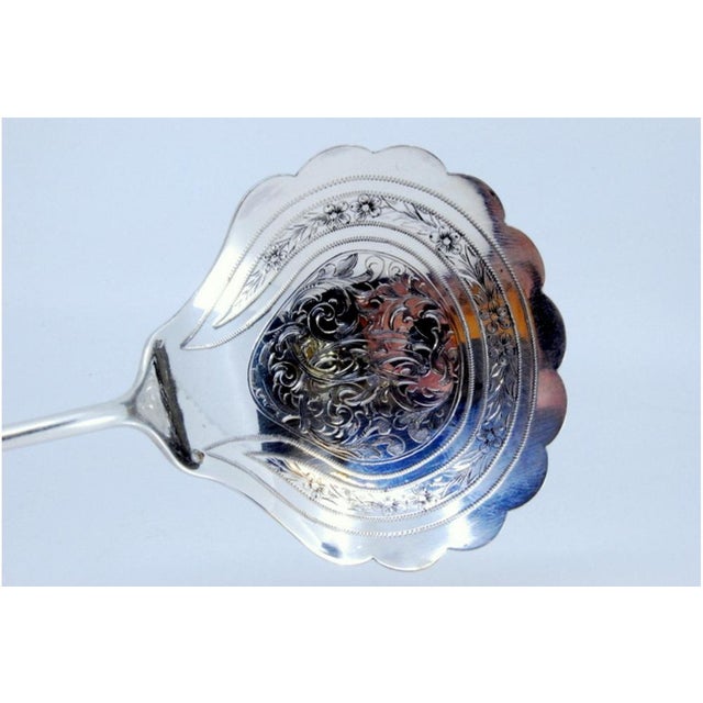 Silver Sauce Spoon with Floral Motifs, in Good conditions.