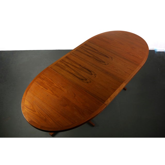 Stately John Mortensen Extending Dining / Conference table in Deep Grained Teak