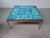 1970s Danish coffee table in aluminium teak and decorated ceramic tiles Spacious lively 1970s coffee table with aluminium...