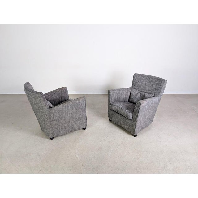 Beautiful set of two "Morgana" armchairs. Made in Italy by Marac, these armchairs impress with their high-quality...
