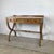Timeless elegance meets everyday versatility in this beautifully proportioned vintage Regency-style console table, a...