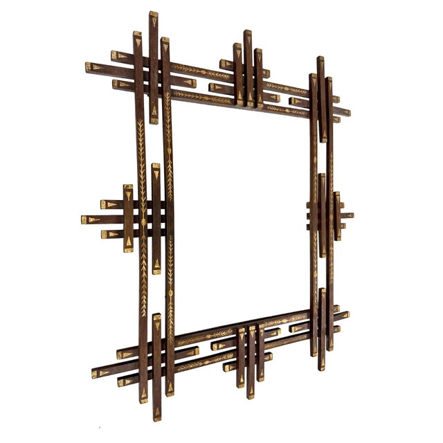 Antique late 1800s/early 1900s folk art picture frame featuring an architectural geometric design constructed from layered...