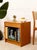 A handsome Danish mid-century nightstand with a warm wood finish and a beautifully understated silhouette. The design...