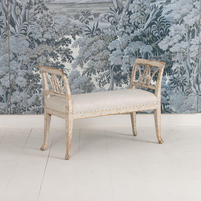 A period Swedish Gustavian window bench made in Lindome in the early 19th century, finished on all four sides and newly...