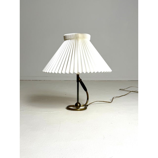Le Klint Model 306 – Table & Wall Lamp by Kaare Klint (1945) A true icon of Danish design – the Le Klint Model 306,...