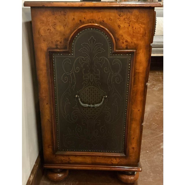 Handcrafted, this impressive chest is made of solid wood with metal inlay of etched brass. Inspired by medieval and...