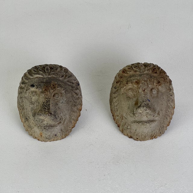 A rare and unique pair of architectural salvage metal lions heads. They were extracted from a New York City building and...