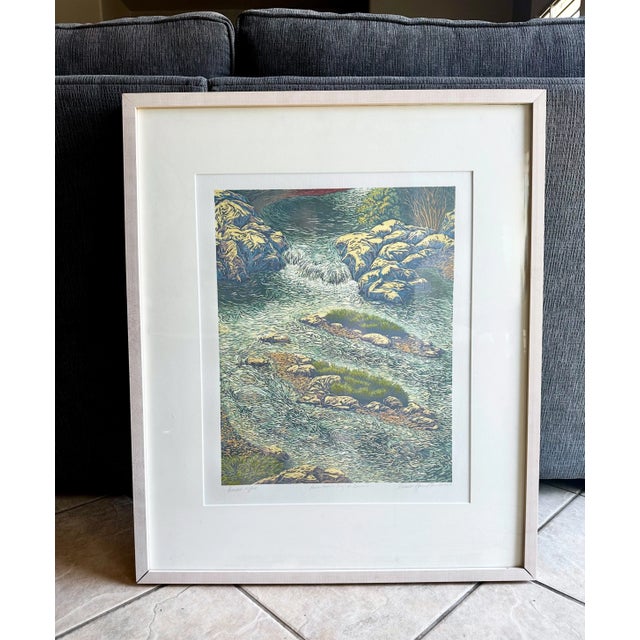 Stylized outdoor nature scene titled "Divided Ripples" done in monotype printing by listed artist Russell Hamilton....