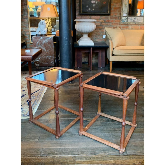 These handsome, well-designed Campaign style tables were hand-crafted in the 1940s. They consist of collapsible walnut...