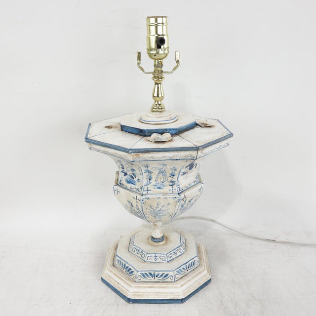 This pair of vintage metal table lamps features a sophisticated octagonal urn silhouette finished in a classic blue and...
