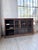 Antique sideboard, a piece of shop furniture with an extra-large size. Formerly a grocery store shelf, we love its...