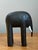 This vintage wooden elephant figurine captures the clean, pared-back spirit of Mid-Century Modern design. Hand carved from...