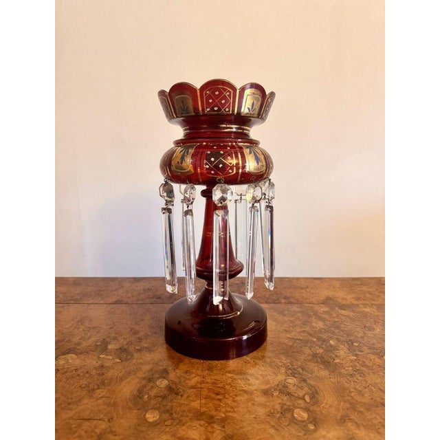 Fine quality large antique Victorian ruby glass lustre, having a shaped top decorated with hand painted detail in...