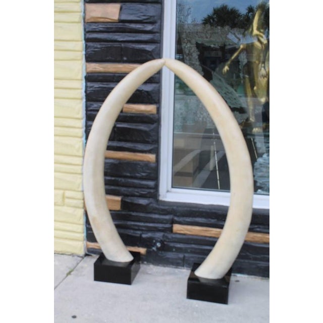 Faux Elephant Tusks on Lucite Bases A Pair Chairish