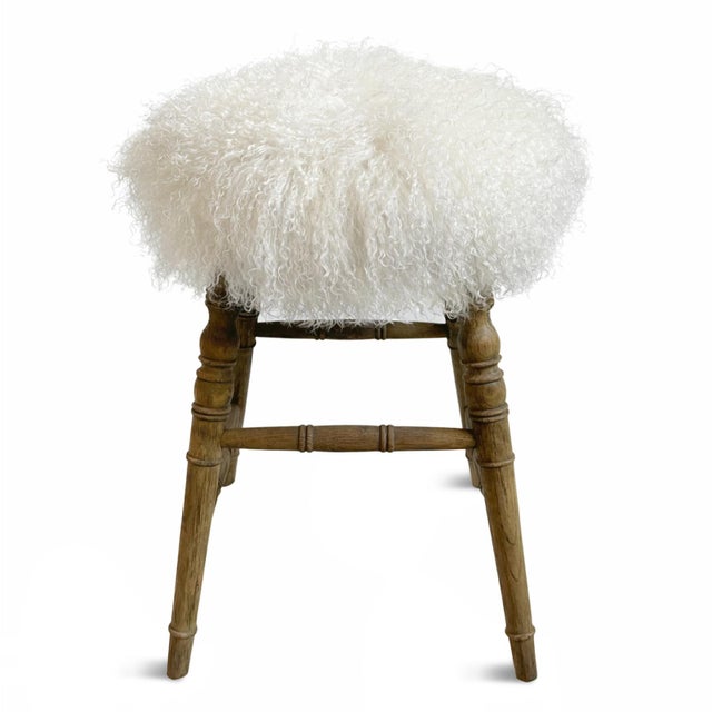 Natural fluffy white mohair seat counter stool with traditional style carved oak wood legs. Each stool may have variations...