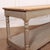 Late 19th C French painted drapers/console table with wonderful scrubbed pine top. 1880 This piece is designed in the...
