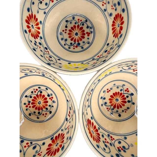 Modern Set of 3 Bat Trang Vietnamese Ceramic Multipurpose Bowls Hand Painted in Red Yellow and Blue Floral Motifs For Sale - Image 3 of 9