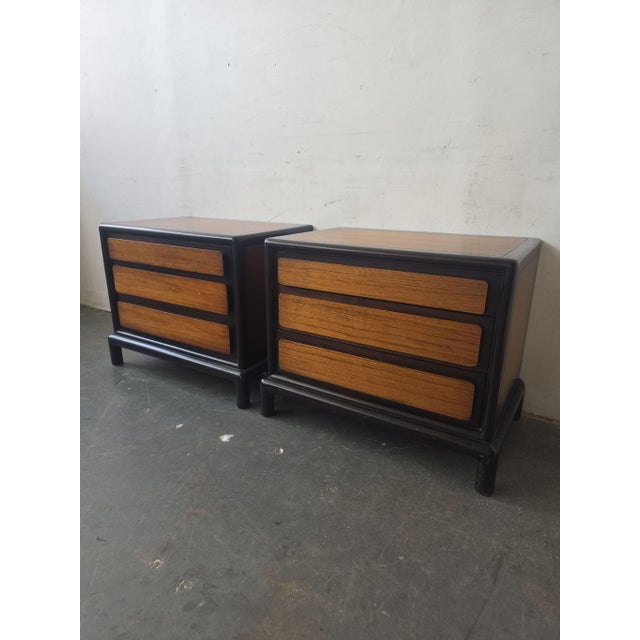 This is a pair of vintage nightstands by John Stuart for Mount Airy. Each nightstand features three spacious drawers with...