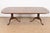 An exceptional Georgian or Chippendale style double pedestal extension dining table By Drexel Heritage USA, Circa 1980s...