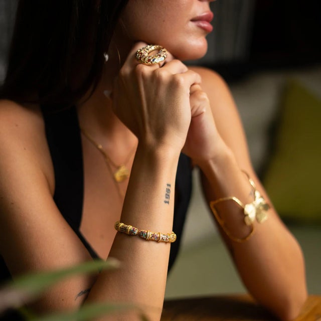 Illuminate your style with the Eternal Lights Gemstone Cuff Bracelet. Handcrafted from bronze and plated with luxurious...