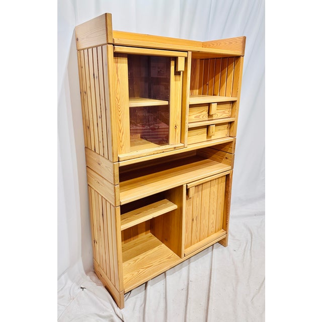 Swedish modular pine cabinet from the 1970s. Great anchor piece. Lovely pine color. Top connects with dowels. Approx...