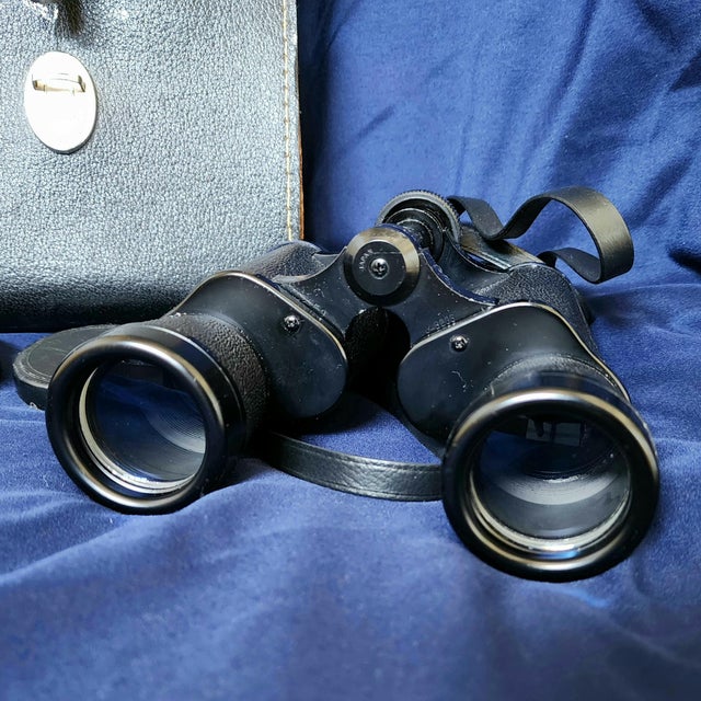 Vintage binoculars with leather case marked Tasco. Case says Made in Japan. Would go perfectly as decor in any nautical,...