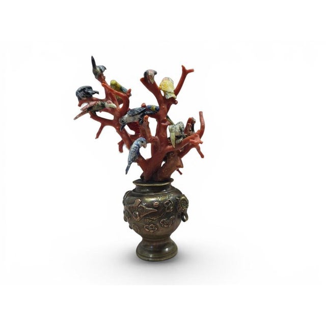 An exceptionally delicate and decorative 19th-century miniature sculpture composed of a finely cast bronze planter issuing...
