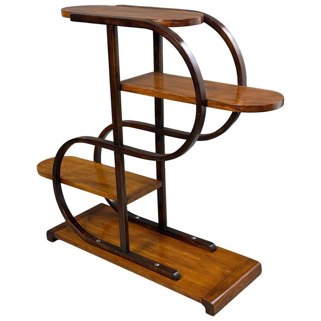 Art Deco plant stand from the interwar period, distinguished by its airy construction and striking combination of...